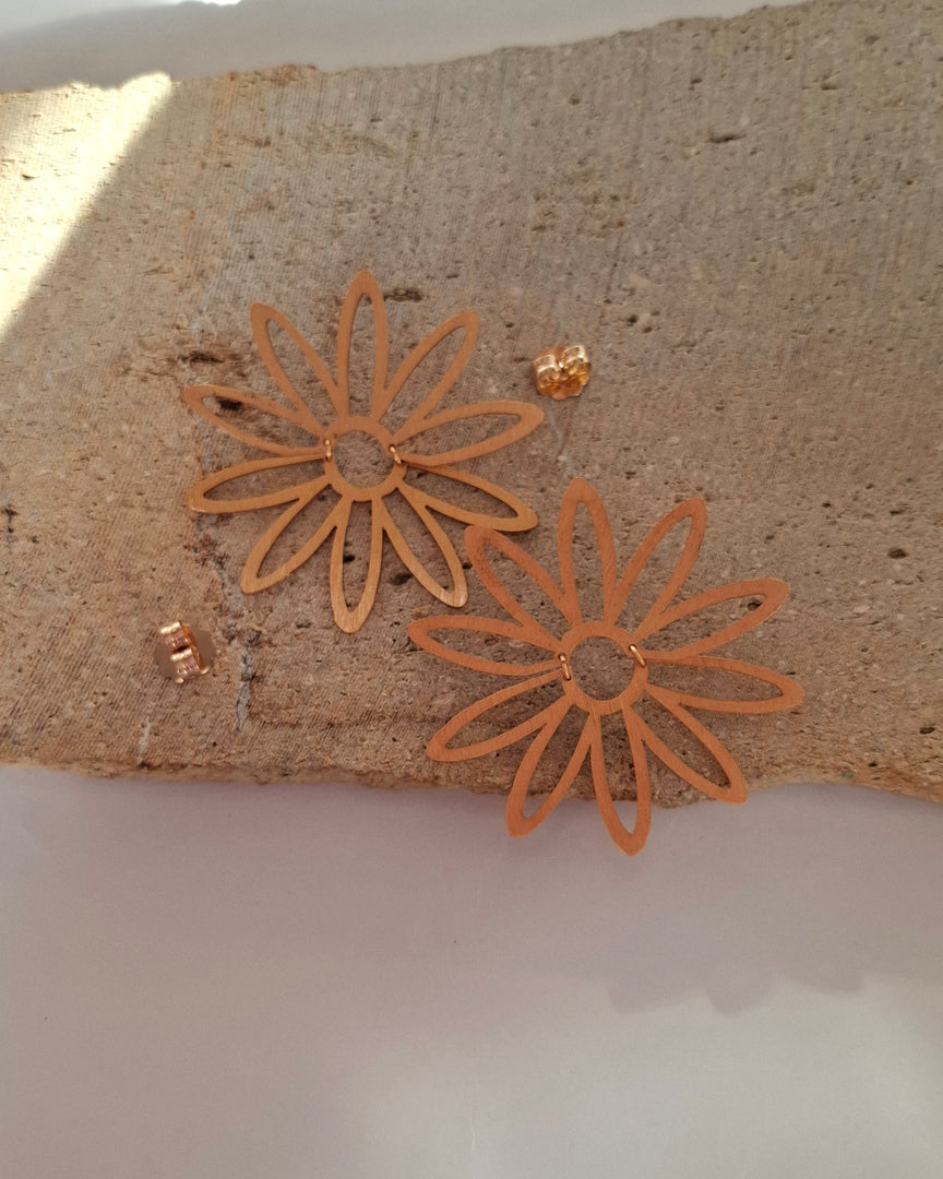 Aretes Pasión Salvaje con detalles de fabricación