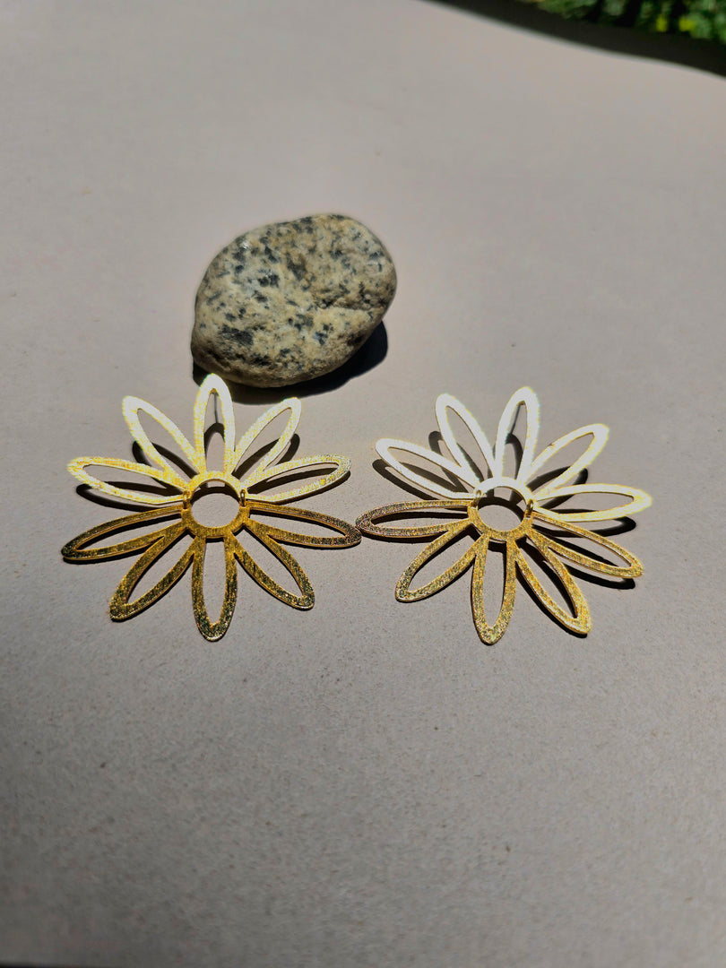 Gy Aretes Pasion Salvaje A con detalles de fabricación.