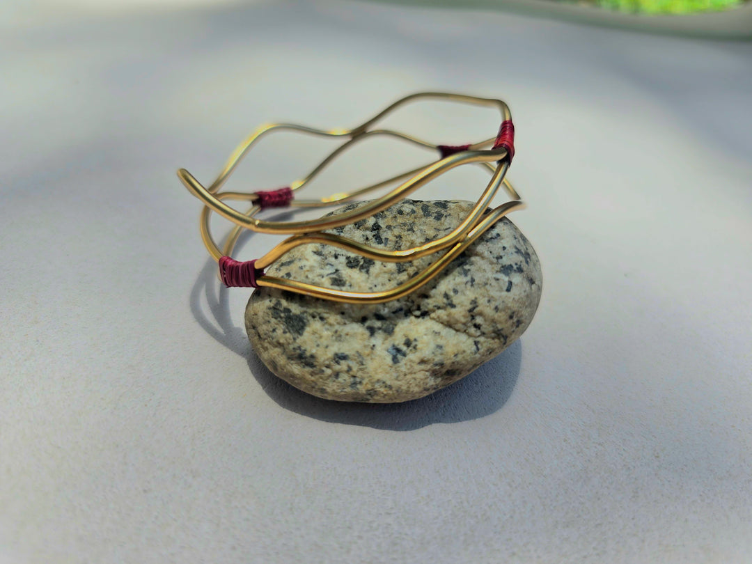 Up Brazalete Estrella Fluvial con detalles de fabricación.