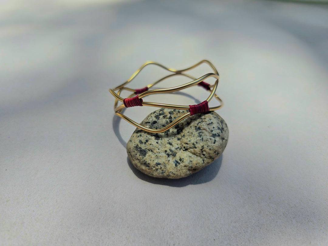 Up Brazalete Estrella Fluvial con detalles de fabricación.