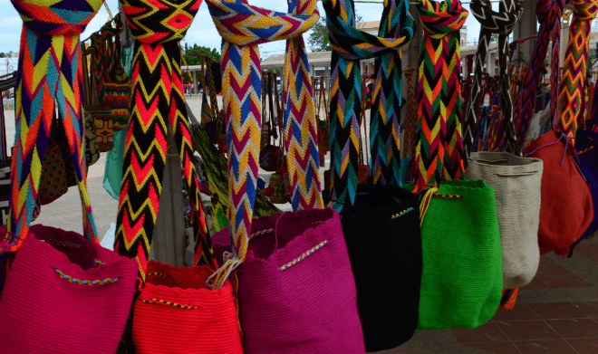 propietario Circunferencia Muestra La mochila Wayuu, emblema y rejido sagrado